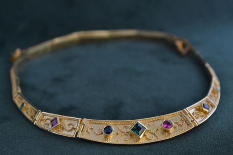 This unique necklace is inspired by Byzantine jewelry. It is made with solid Sterling Silver (925 Silver), and has a 22K Gold-plating all over. The necklace is also enriched with Cubic Zirconia stones of various colours. Medieval Necklace, Hand Jewelry Rings, Ethereal Jewelry, Byzantine Jewelry, Byzantine Necklace, Victorian Jewellery, Neck Pieces Jewelry, Princess Jewelry, Medieval Jewelry