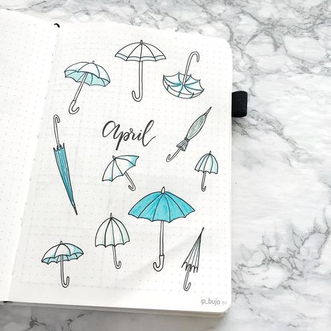 Ingvill | Bullet Journaling ✨ on Instagram: “April showers and all that ☔️💙 Here’s my cover for April! Finally landed on an umbrella theme 😍 - - - - - #bulletjournal #bulletjournals…” Rain Doodle, Planer Ideas, April Bujo, Calendar Doodles, April Bullet Journal, Bujo Spreads, Bullet Journal Hacks, Bullet Journal Diy, Bullet Journal Notebook