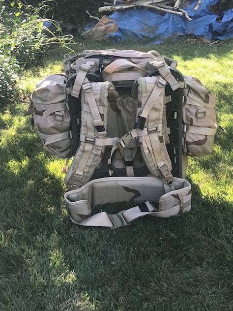 Large Ruck Sack on Foliage Green Frame Ruck Sack, Military Style Green Backpack For Outdoor, Green Military Parka With Pockets, Military Parka With Patch Pockets For Outdoor, Military Style Bags With Adjustable Strap For Outdoor, Military Rucksack, Green Frame, Us Army, Combat Boots