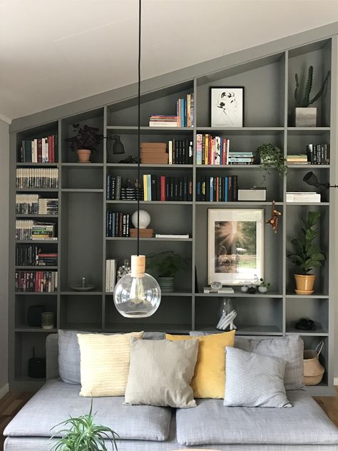 Living Room Built Ins Angled Ceiling, Bookcase On Slanted Wall, Built In Shelves Sloped Ceiling, Slanted Built In Bookshelf, Sloped Ceiling Shelving, Bookshelf Sloped Ceiling, Bookcase On Angled Wall, Built Ins On Angled Wall, Bookcase Sloped Ceiling