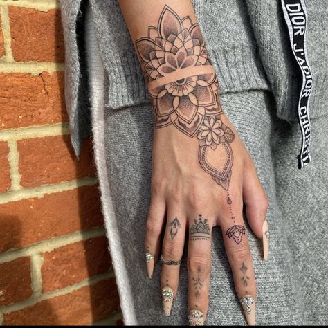 Hand and finger tattoos Jordan Lipscombe Jordan Lipscombe, Tattoo Fairy, Mandala Hand Tattoos, Cuff Tattoo, Finger Tattoo For Women, Hand Tattoos For Girls, Cute Hand Tattoos, Hand And Finger Tattoos, Pretty Hand Tattoos