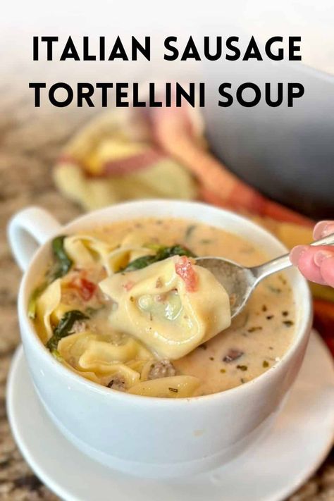 This Italian Sausage Tortellini Soup is a one pot soup that uses store-bought tortellini and comes together in 30 minutes for a creamy weeknight dinner. Italian Sausage Tortellini Recipes, Sausage Tortellini Soup Stovetop, Tortellini Soup Crockpot, One Pot Soup, Italian Sausage Tortellini, Italian Sausage Tortellini Soup, Turkey Italian Sausage, Creamy Tortellini Soup, Sausage Tortellini Soup