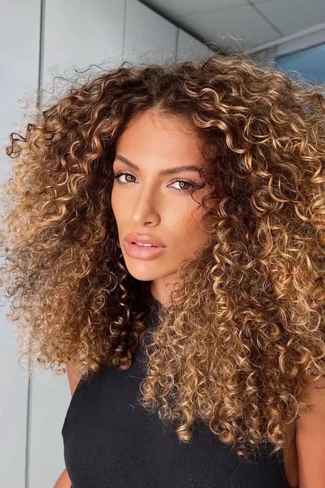 Embrace the beauty of contrast with brown hair and contrasting highlights! ✨ Discover striking color combinations at Glaminati.com. #ContrastHighlights #HairColorInspo Hairstyle Cornrows, Caramel Blonde Hair Color, Stacked Inverted Bob, Crazy Curly Hair, Inverted Bob Haircut, Blonde Hair Colour Shades, Caramel Blonde Hair, Hair With Highlights, Brown Curly Hair