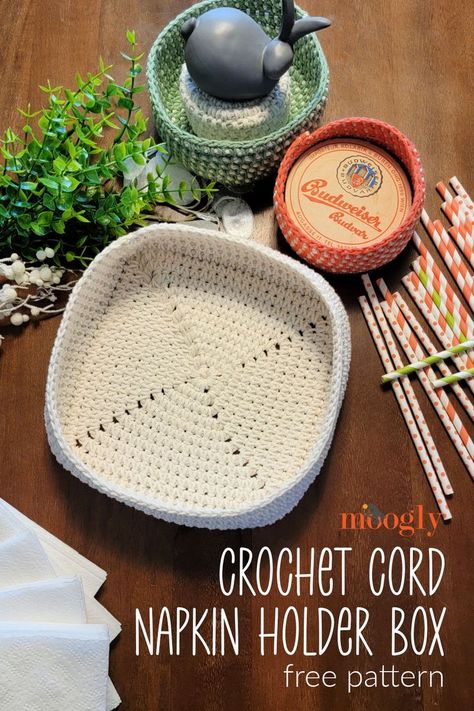 The Crochet Cord Napkin Holder Box is great for organizing your home - and office! Made to match the Crochet Cord Nesting Bowls, this box is sized for the dining table but ideal for any space. With your favorite colors of cotton yarn and a coordinating roll of Bernat Macramé, you can make your own cord box with this free crochet pattern on Moogly! It's part of the Cozy at Home Crochet Along on CAL Central! #CALCentralCrochet Moogly Crochet, Cord Box, Home Crochet, Crochet Storage Baskets, Cozy At Home, Crochet Box, Crochet Storage, Box Tutorial, Crochet Cord