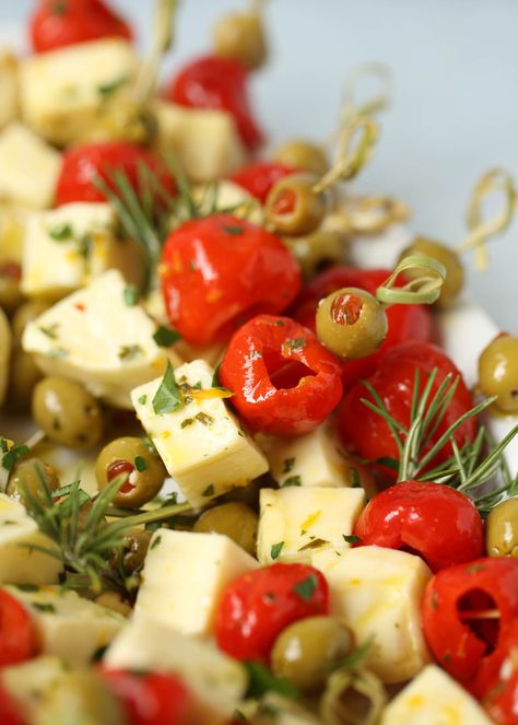 Marinated Cheese & Olive Skewers Cheese Olive Skewers, Appetizer With Olives, Feta Skewers Appetizers, Olives And Cheese Appetizer, Olive And Cheese Platter, Olive Themed Party, Marinated Olives And Cheese, Marinated Cheese And Olives, Olive Skewers