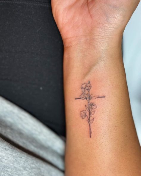 Dainty Catholic Tattoos, Small Cross Wrist Tattoo, Christian Arm Tattoos For Women, Simple Christian Tattoos For Women, Wrist Cross Tattoo, Dainty Christian Tattoos, Cross With Flowers Tattoo, Cross Tattoo On Wrist, Simple Cross Tattoo