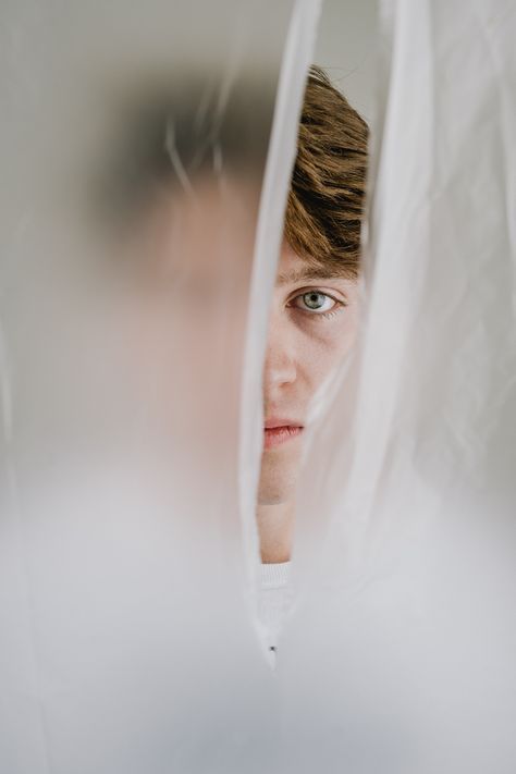 studio portrait with plastic sheeting Plastic Wrap Photography, Plastic Sheet Photography, Creative Studio Portraits, Plastic Photoshoot, Plastic Portrait, Transparent Photography, Studio Portraits Creative, Plastic Photography, Male Art Photography