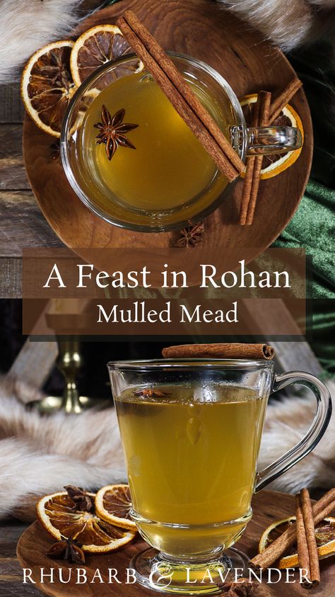 Warm honeyed mead that's been spiced and flavoured with apricot brandy and citrus is the perfect comforting drink to savour in the feasting halls of Rohan! This recipe for mulled mead is inspired by the Kingdom of Rohan from JRR Tolkien's The Lord of the Rings. The perfect spiced hot drink for the fall or winter or for a Lord of the Rings themed party! Lotr Themed Drinks, Lord Of The Rings Themed Cocktails, Lord Of The Rings Cocktail, Lotr Drinks, Lord Of The Rings Dinner Party, Yule Drinks, Mulled Mead, Lord Of The Rings Recipes, Lord Of The Rings Food