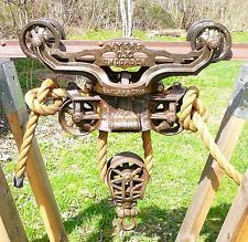 ANTIQUE F.E. MYERS & BROS.OK UNLOADER CAST IRON HAY TROLLEY Hay Trolley, Pocket Neighborhood, Entrance Lighting, Block And Tackle, Basement House Plans, Wood Beam, Rustic Pendant Lighting, Farm Machinery, Arts Crafts Style