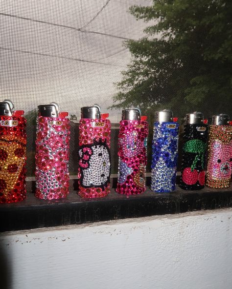 Bedazzle lighters DROP IS LIVE NOW!!! ⭐️⭐️⭐️ there is only 1 of each design available… website in bio Bedazzled Lighter Diy, Diy Lighter Design, Lighters Decorated Diy, Lighter Decor, Bedazzled Designs, Things To Bedazzle, Bedazzled Lighter, Bedazzle Ideas, Bedazzled Stuff