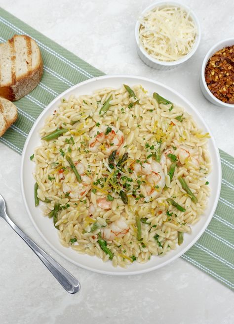 Lemon Shrimp Orzo with Asparagus is a light recipe that is fast and easy to make. Lemon adds a certain brightness to just about anything and this recipe has both lemon juice and zest. Lemon Shrimp Orzo, Orzo With Asparagus, Orzo Asparagus, Asparagus Orzo, Lemon Pepper Shrimp, Shrimp Orzo, Lemon Shrimp, Orzo Recipes, Shrimp Recipes Healthy