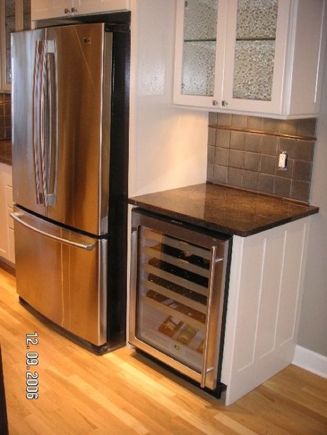 Glass cabinets above, wine paneling next to fridge so side of fridge is not exposed Bar With Mini Fridge And Wine Cooler, Horizontal Wine Fridge, Wine Fridge Bar, Clear Mini Wine Fridge, Glass Front Mini Fridge, Small Wine Fridge Lowe's, Wine Fridge Cabinet, Small Kitchen Pantry, Built In Wine Rack