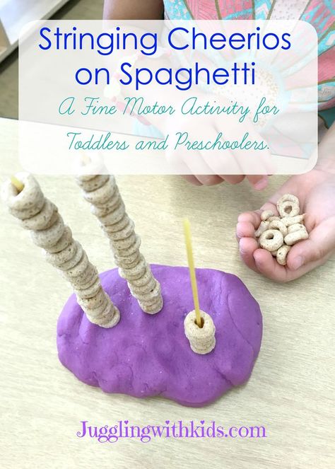 Fine Motor Activity Stringing Cheerios on Spaghetti. Great for toddlers and preschoolers working on hand eye coordination and strengthening fingers ready for writing. Using just dried spaghetti, cheerios and play dough this challenge can be set up in minutes. #jugglingwithkids.com #finemotoractivities #finemotorpreschool #finemotortoddlers #pincergrip #cheerios #spaghettinoodle #playdough #finemotorskills #finemotorforkids Toddler Fine Motor Activities, Preschool Fine Motor Activities, Fine Motor Activity, Fine Motor Activities For Kids, Easy Toddler Activities, Hand Eye Coordination, Preschool Fine Motor, Fine Motor Skills Activities, Motor Skills Activities