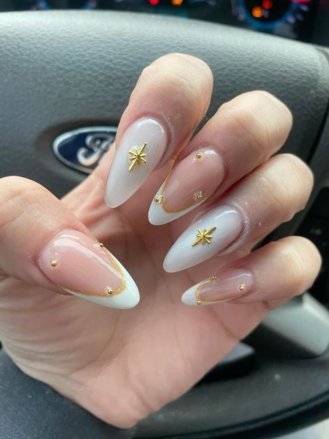 Fancy Oval Nails, Charmed Nails Acrylic, White Grad Nails Almond, Nails White Gold Design, Classy Nails Design Ideas Almond, Nail Designs With Gold Charms, Almond Nails For Graduation, Xl Almond Nails Designs, Nail Inspiration With Charms