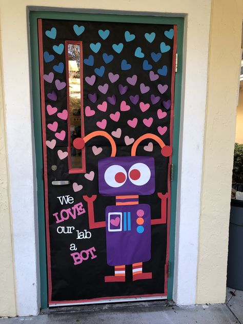 Valentine Science Lab Door Bulletin Board Robot Idea Unicorn Valentine Box Diy, Computer Lab Bulletin Board Ideas, Valentines Door Decorations Classroom, Valentines Classroom Door, Valentines Day Classroom, Diy Valentine's Box, Computer Lab Decor, Classroom Door Ideas, Computer Lab Classroom