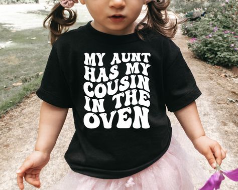 My Aunt Has My Cousin In The Oven Shirt, Cousin Shirt, Infant Toddler or Youth Shirt, Pregnancy Announcement, Big Cousin Shirt, Retro Cousin Processing time is 1-2 business days! Shipping from TX, USA. *Please send us a message if you have any questions regarding colors, sizes, and designs.* To order: -Pick a color and size, select quantity, and add to your cart. How to wash? -Make sure to turn the shirt inside out before washing. -Select gentle cycle and use warm water. -Do NOT iron over the de Cousin 1 Cousin 2 Shirts, Cousin Crew Announcement, Promoted To Big Cousin Shirt, My Aunt Is Pregnant, Best Friend Auntie To Be, My Aunt Has My Cousin In The Oven, Promoted To Big Cousin Announcement, New Cousin Announcement, Baby Reveal Ideas To Parents Grandparents Pregnancy Announcements