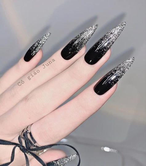 Black And Silver Goth Nails, Long Black Stilleto Nails Design, Goth Stilleto Nails Designs, Nail Designs Long Black, New Year Nails Design 2024 Black, Pointed Acrylic Nail Designs, Goth New Years Nails, Black Nails Acrylic Stilettos, Gothic Nails Designs