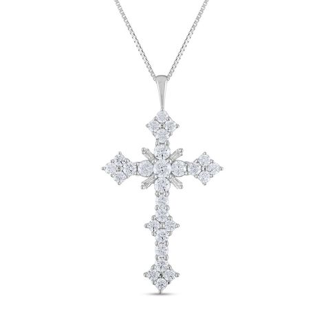 Dare to dazzle in a faith-inspired look when you wear this enchanting diamond sunburst center cross pendant in white gold. Created in 14K white gold The center showcases a 1/4 ct. round diamond in a burst of shimmering round and baguette-cut diamonds. Quartets of diamonds sparkle along each of the diamond-lined edges. Stunning with 3 cts. t.w. of diamonds This pendant suspends along an 18.0-inch box chain that secures with a spring-ring clasp. Jewelry Style, Diamond Cross, Baguette Cut Diamond, Cross Jewelry, Baguette Cut, Box Chain, Jewelry Store, Spring Rings, Cross Pendant