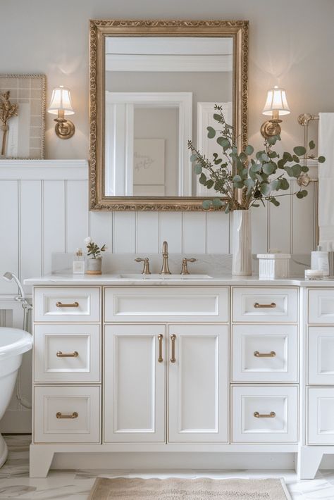 Small Bathroom Gold Mirror, Modern Vintage Bathroom Mirrors, White And Gold Half Bath, Neutral Gold Bathroom, Warm Neutral Bathroom Ideas, Modern Antique Decor, Modern Bathroom Mirror Ideas, Bridgeton House, Gold Hardware Bathroom