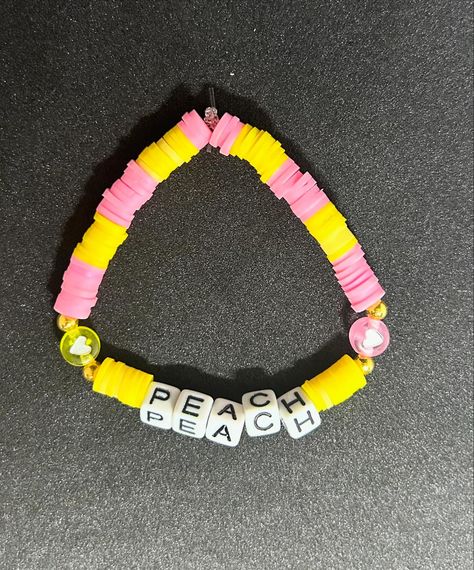 Princess Peach 👑 (Super Mario) Heishi Bracelet #handmadebracelet #heishibracelets #beadedbracelets #bracelets #personalizedbracelets #personalizedbracelet #etsy #etsyshop #etsyseller #etsyfinds #etsysellersofinstagram #etsyjewelry #etsyjewelryshop #mariobros #mario #supermario #supermariobros #supermariobracelet #supermariobracelets #princesspeach #princesspeachcosplay #princesspeach👑 #princesspeach🍑 #princesspeachbracelet #princesspeachfan Princess Peach Cosplay, Heishi Bracelet, Personalized Bracelets, Super Mario Bros, Etsy Jewelry, Mario Bros, Super Mario, Handmade Bracelets, Princess Peach