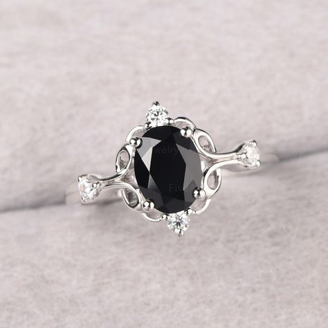 ◆ The ring is handcrafted from sterling silver and decorated with a dazzling 8*6 mm black spinel and CZs. It is suitable for engagement/anniversary/daily occasion. ◆ Production Description: Main stone Type: Natural Black Spinel Main Stone Shape: Oval Cut Main Stone Size: 8*6 mm(1.45ct) Side stone: CZ Metal: 925 Sterling silver - Other options available in the drop down menu ◆ Customization: √Free for Add Engraving √Other Metal Type Available √Other Gemstones & Shapes Available √Personalization R Gothic Promise Rings For Her, Obsidian Engagement Ring, Christmas Wedding Ring, Ring With Black Stone, Engagement Ring Black, Gothic Engagement Ring, Black Spinel Ring, Beautiful Engagement Ring, Spinel Ring