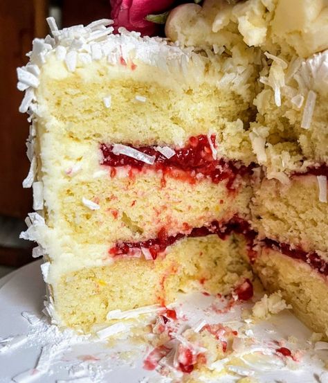 Coconut Raspberry Cake – Eat at Maude's Coconut Cake With Raspberry Filling, Coconut Raspberry Cake, Coconut Cake With Raspberry Filling Recipe, Zinger Recipe, Raspberry Coconut Cake, Strawberry Whipped Cream Cake, Raspberry Zinger, Raspberry Cake Recipe, Coconut Layer Cake