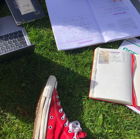 a flat lay including notebooks, study materials, a laptop and a red converse shoe Bright School Aesthetic, Studying Outside Aesthetic, Note Taking Notebooks, Bright Academia Aesthetic, Bright Academia, Studying Outside, Vibrant Academia, Romanticising Studying, Spring Energy