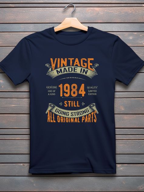 Ready for an epic shopping spree? 1984 Birthday T-Shirt | Retro 40th Birthday Gift for Him or Her | Limited Edition Birthday Shirt, at a mind-blowing price of £15.00 Don't wait!
#BirthdayGiftIdea #40thBirthdayShirt #Happy40th #FunnyBirthdayTee #40thBirthday #1984BirthdayGift #40thBirthdayGift #40YearsOldGift #Vintage1984TShirt #HappyBirthdayTee Vintage 1983 Shirt, Vintage 1985 Shirt, Cheap Vintage T-shirt For Birthday, 1984 Birthday, 1984 Shirt, Vintage 1980 Tshirt Birthday, Green Colours, Happy 40th, Birthday Tshirts