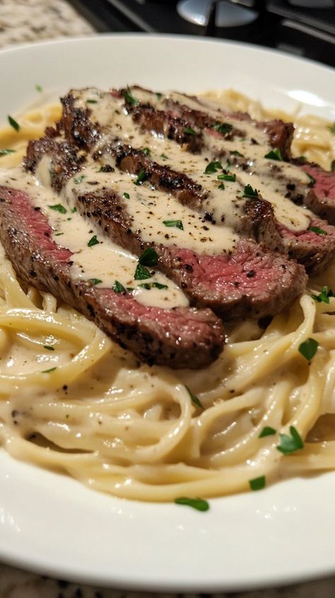 Treat yourself to the luxurious flavors of Steak Gorgonzola Alfredo ! This Steak Pasta Recipes Alfredo combines tender steak, a rich Gorgonzola Alfredo sauce, and a touch of Mushroom Gorgonzola Sauce for a dish that's both creamy and savory. Perfect for Fancy Dinner Recipes Steak , this Steak and Fettuccine dish is a Steak with Pasta favorite that's sure to delight. The Gorgonzola Steak Pasta is topped with a creamy parmesan sauce, making it a Savory Steak Gorgonzola Alfredo that's perfect for any special occasion. Whether you're hosting a dinner party or enjoying a cozy night in, this dish is a must-try. Steak With Pasta, Gorgonzola Steak, Steak Gorgonzola Alfredo, Steak Pasta Recipes, Gorgonzola Alfredo, Dinner Recipes Steak, Steak Gorgonzola, Steak Dinner Ideas, Gorgonzola Sauce