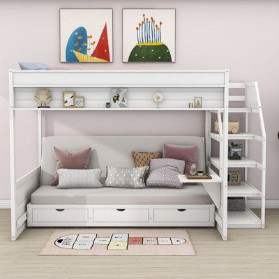 This bunk bed is the perfect space-saving solution for any bedroom, constructed with durable pine wood and MDF and supported by sturdy slats, without the need for a box spring. The innovative design folds the bottom bed into a comfortable seating area during the day, while the three built-in drawers provide ample storage space for clothes and toys. Due to different photographic light sources or your monitor, the actual color may be slightly different. Bed Frame Color: White | Harriet Bee Dalvey Bunk Bed Girls Room, Bunk Bed Rooms Decor, Loft Bed With Couch, Bunk Beds For Girls Room, Staircase Wood, Bunk Beds Small Room, Storage Staircase, Bunk Bed With Storage, Futon Bunk Bed