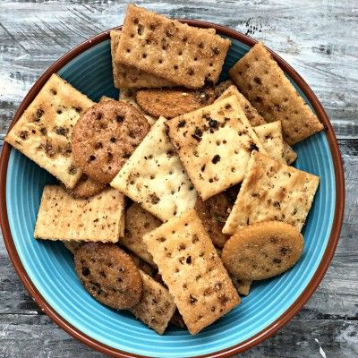 Browning the butter releases a whole new depth of toasty, buttery flavor in these crackers. Seasoned with a touch of Old Bay, they keep perfect company with our Seafood Cocktail — and with soups, salads or as a snack. Use one kind of cracker, or a variety like we did. Crackers Seasoned, Seasoned Crackers, Soda Crackers, Club Crackers, Seasoned Butter, Seafood Cocktail, Butter Crackers, Baked Crackers, Bacon Fries