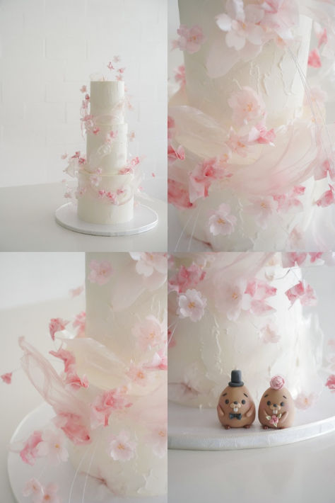 A three-tier wafer paper pink sakura flower wedding cake decorated with a pair of customized fondant topper. Pink Cake With Flowers, Blossom Wedding Cake, Wedding Cake With Fondant, Cherry Blossom Wedding Cake, Whimsical Wedding Cakes, Sakura Wedding, Flower Wedding Cake, Cherry Blossom Cake, Blossom Cake