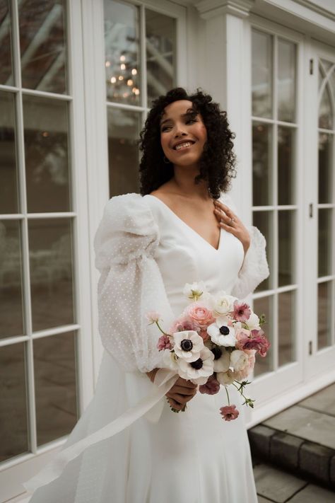 Elegant wedding dress with statement sleeves, paired with a pink and white anemone bridal bouquet at glasshouse wedding venue The Old Vicarage. Pink Anemone Bouquet, Anemone Bridal Bouquet, Glasshouse Wedding, Glass House Wedding, Anemone Bouquet, Wedding Notes, Mini Wedding Dresses, White Anemone, Boutique Wedding