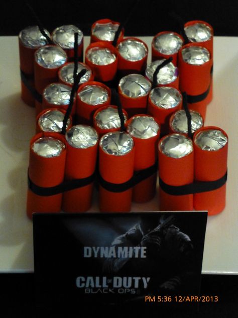 Dynamite - Cool, but not sure how it's made! Lifesavers, wrapped in red felt maybe?? and black ribbon/yarn to tie them, and black yarn or pipe cleaners for the "wick"?? Call Of Duty Birthday Party, Army Birthday Parties, Camo Party, Military Party, Army's Birthday, Army Party, Nerf Party, 13th Birthday Parties, Game Party