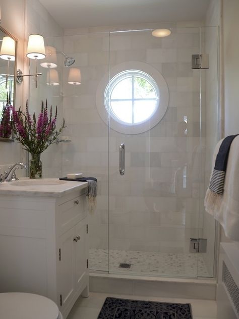 White marble tiles- maybe with square of the shell penny tiles on the floor? Shower With Window, Cottage Bathrooms, Circular Window, Shower Window, Big Shower, Shower Tiles, Window In Shower, Shower Glass, Chic Bathroom