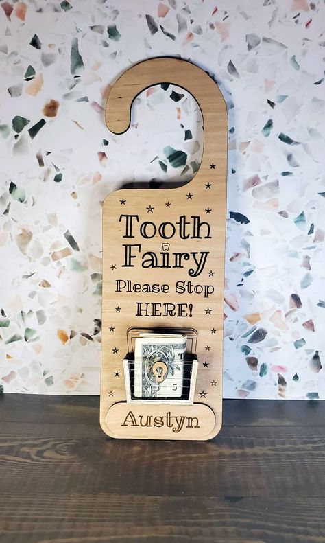 Genius!!! No more digging under pillows or forgetting! Tooth🦷🧚‍♀️Fairy treasure box door hangers, with or without personalization. Fits money 💵🪙 and the mini tooth treasure boxes from dentists and school. See photos!
🦷 Reusable
🧚‍♀️ Keepsake
Can work with large families! Fairy Treasure, Tooth Fairy Door Hanger, Tooth Fairy Door, Tooth Fairy Doors, Wood Laser Ideas, Diy Tooth Fairy, Tooth Fairy Box, Tooth Box, Door Hangers Diy