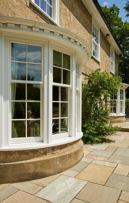 Faceted/shaped bay windows to the side elevation with a curved cill projection to finish Side Elevation, Sash Window, Timber Windows, Bay Windows, Listed Building, Sash Windows, Bay Window, New House Ideas, Joinery