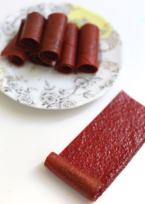 Remember the days of strawberry fruit roll-ups in your lunch bag? We’re bringing them back, my friends. Ooooh yes. I mentioned on Friday we were making strawberry fruit leather this weekend since it’s peak strawberry season. Actually, someone once told me that Mothers Day marks kind of the end of strawberry season, sadly, so it’s … Diy Fruit Strips, Strawberry Fruit Leather Recipe, Garden Preservation, Classic Snacks, Strawberry Fruit Leather, Sun Oven, Homemade Fruit Leather, Children's House, Fruit Leather Recipe