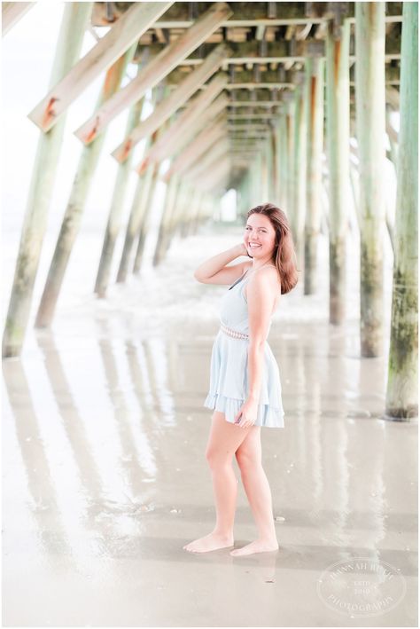 Beautiful senior posing in a blue dress on the beach under a pier for senior photos. Myrtle Beach photographer Hannah Ruth Wedding Photographer Outfit, Myrtle Beach Photography, Charleston South Carolina Wedding, Creative Senior Pictures, Senior Photo Ideas, Photographer Outfit, Senior Posing, Myrtle Beach Wedding, South Carolina Wedding