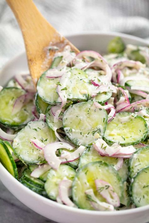 This Creamy Cucumber Salad recipe is a classic family favorite recipe. Thinly sliced cucumbers and onion are tossed in a creamy vinaigrette for an easy side dish. Cumcuber Salad, Salad Cream, Cucumber Salad Recipe, Creamy Cucumber Salad, Cucumbers And Onions, Creamy Cucumbers, Grape Salad, Salad Pasta, Cucumber Recipes Salad