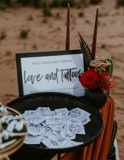 Temporary Tattoo Station, Dark Romantic Wedding, Gothic Wedding Theme, Tattoo Station, Punk Wedding, Australian Desert, Dark Wedding Theme, Halloween Themed Wedding, Rock Wedding