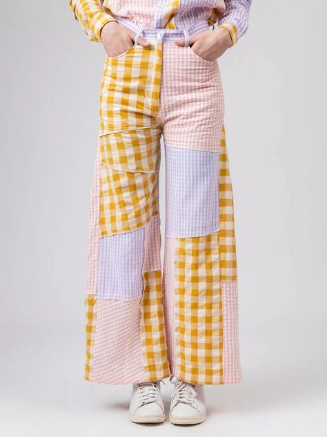 Our Erin Patch Pants offer an exquisite combination of modern style and luxury. Featuring a flared silhouette, button + zipper closure in front, and side pockets, these regular fit trousers are crafted from upcycled cotton deadstock fabric in a vibrant multicolor palette. Patch Work Pants, Fabric Upcycle, Upcycled Thrift, Multicolor Palette, Ropa Upcycling, Unique Pants, Upcycling Fashion, Patch Pants, Patchwork Pants