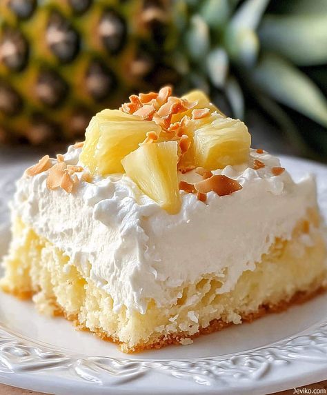 Piña Colada Poke Cake: A Taste of Paradise! Pina Colada Poke Cake Recipe, Crispy Crunchy Parmesan Potatoes, Crunchy Parmesan Potatoes, Classic Fudge Recipe, Pina Colada Poke Cake, Brown Sugar Fudge, Perfect Whipped Cream, Pina Colada Cake, Chocolate Caramel Pretzels