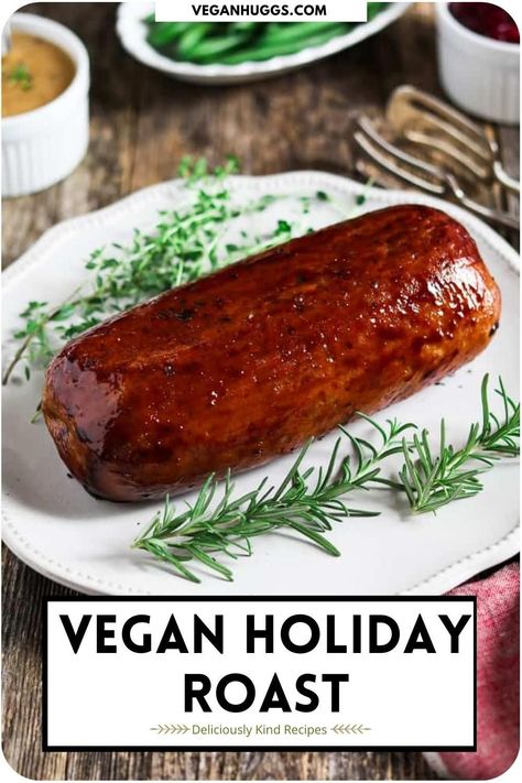 Make your festive dinner complete with this Vegan Holiday Roast. It's filled with savory stuffing and finished with a mouth-watering glaze. #VeganHuggs #VeganRecipes #veganholiday #meatlessroast Vegetarian Christmas Meals, Vegan Harry Potter, Vegan Xmas Dinner, Holiday Roast, Vegetarian Stuffing, Vegan Meat Recipe, Vegan Thanksgiving Dinner, Christmas Vegan, Vegan Christmas Dinner