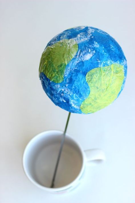 Tissue paper, a styrofoam ball, and a bit of glue is all you need to make a darling little globe craft. A fun craft for Earth Day or a solar system unit craft! Hang with a small hook and string from the ceiling for a fun way to display! Styrofoam Ball Crafts, Paper Globe, Tissue Paper Craft, Globe Crafts, Green Tissue Paper, Tissue Paper Crafts, Vbs 2023, Blue Tissue Paper, Forbidden Planet