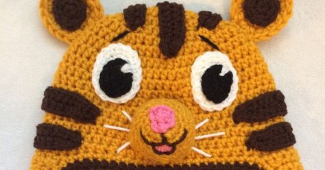 A free crocheted hat pattern of the adorable Daniel Tiger. Tiger Party, Crochet Tiger, Crochet Character Hats, Crochet Animal Hats, Knit Items, Crochet Kids Hats, Craft Crochet, Hat Patterns Free, Daniel Tiger