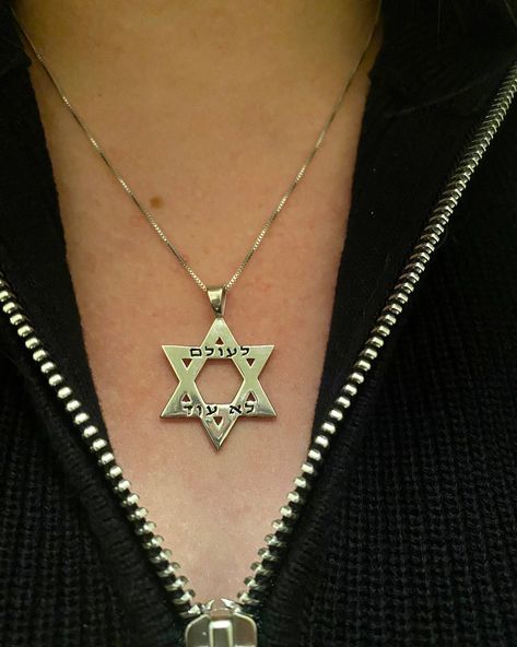 "\"Never Again\" written in Hebrew letters on a Star of David.  Material: Sterling silver. Chain included." Hebrew Letters, Lion Pendant, Star Of David Pendant, Never Again, Olive Leaf, Star Of David, Leaf Necklace, Sterling Silver Chain, Pendant Necklaces