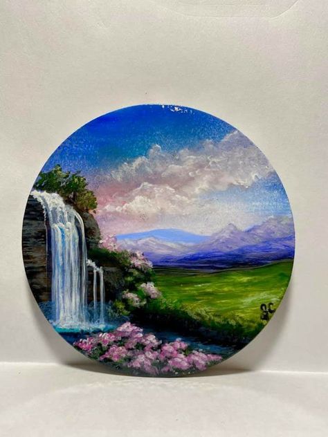 Flower Painting On Round Canvas, Round Canvas Painting Ideas Wall Art, Circle Landscape Painting, Art Logos Ideas, Painting On Circular Canvas, Circle Acrylic Painting, Circle Canvas Painting Aesthetic, Round Painting Ideas, Circle Canvas Painting Ideas