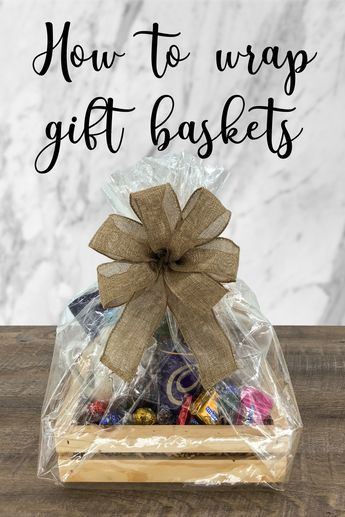 Gift Basket Ribbon Wrapping Ideas, How To Clear Wrap A Gift Basket, Christmas Basket Wrapping Ideas, How To Wrap Baskets Gift, How To Make A Bow For A Gift Basket, Wrapping A Basket Gift, Gift Baskets Wrapping Ideas, Wrapping Baskets Ideas, Christmas Gift Basket Wrapping Ideas