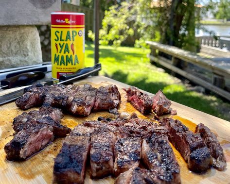 If you're looking for a simple yet flavorful steak recipe that can be whipped up in no time, look no further than this Slap Ya Mama grilled steak recipe. With just a few ingredients and a hot grill, you can have a juicy, tender steak seasoned to perfection with the signature Slap Ya Mama Seasoning. This recipe is perfect for those who love a good steak but don't want to spend hours prepping and cooking. Slap Yo Mama Seasoning, Slap Ya Mama Seasoning Recipe, Slap Ya Mama Seasoning, Seasoning Steak, Slap Ya Mama, Grilled Steaks, Buffalo Chicken Sliders, Olive Salad, Buffalo Wing Sauce